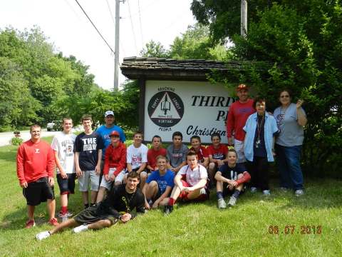 Fishers' baseball team volunteers at Third Phase